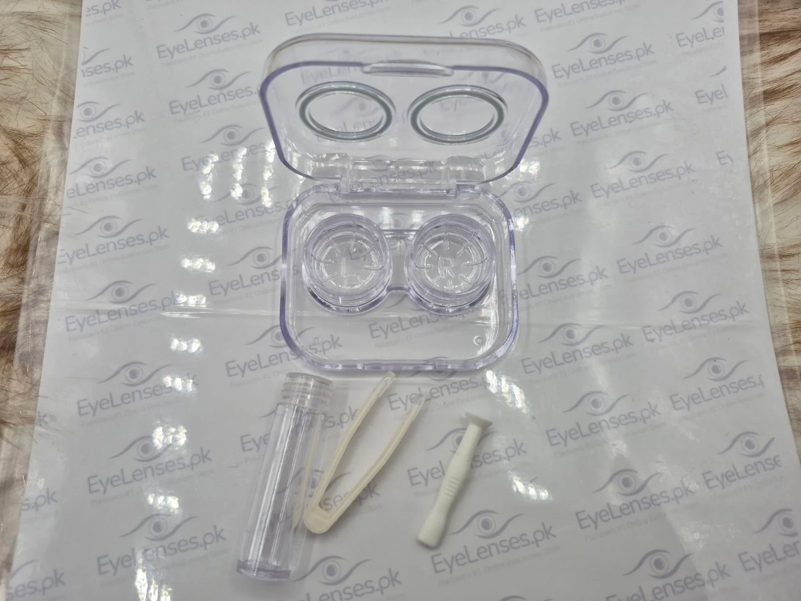 LENS SET CASING